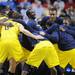 Michigan senior Corey Person stands in the middle of the Michigan huddle before the start of their second round NCAA match up against Ohio University at Bridgestone Arena in Nashville, Tenn.  Melanie Maxwell I AnnArbor.com